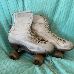 Betty Lytle Styled by HYDE wooden wheel roller skates. Probably 50”s Size 8
